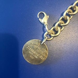 Tiffany bracelet. Lauren engraved on back. Circle.